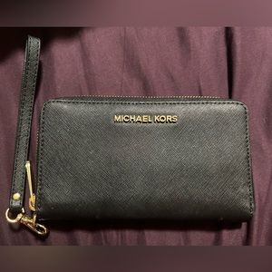 Michael Kors zip around black wallet/wristlet